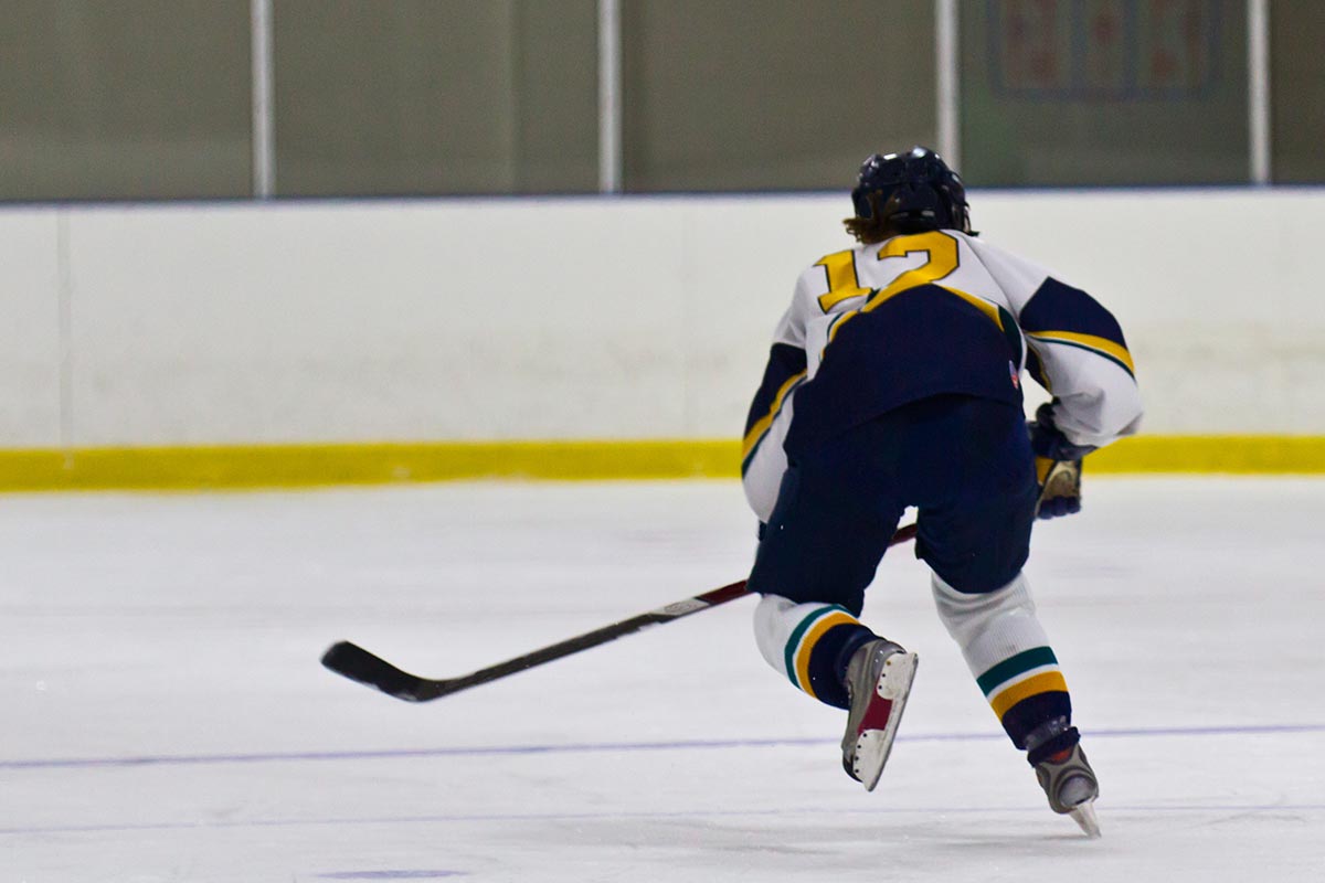 Hockey Player Doing a Racing Drill Hockey Player Doing a Racing Drill